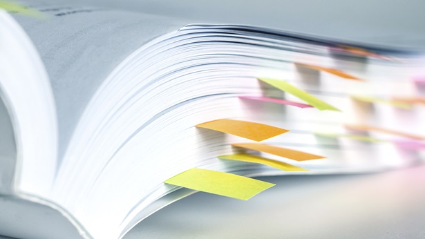 Bookmarked pages in a paperback book