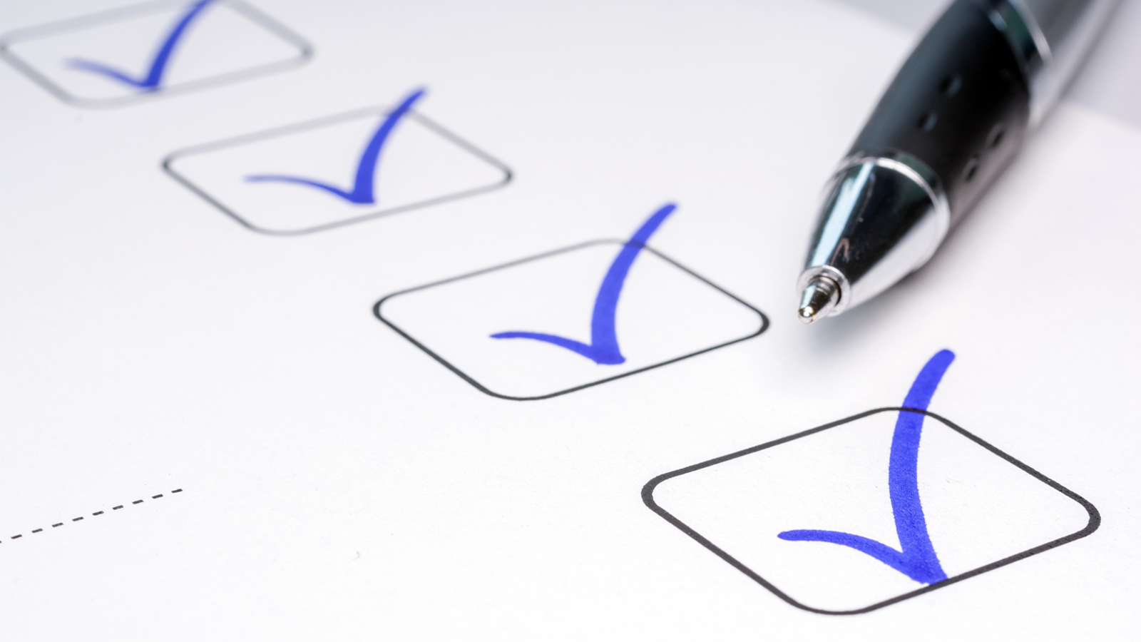 Checklist checked off with pen next to it