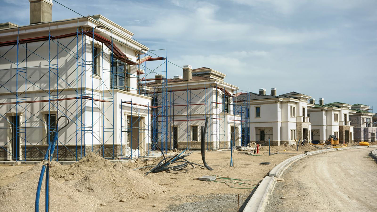 A row of houses being constructed