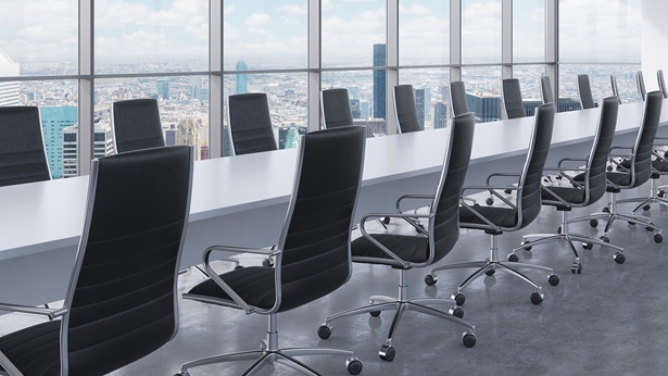 Long table with chairs in a meeting room