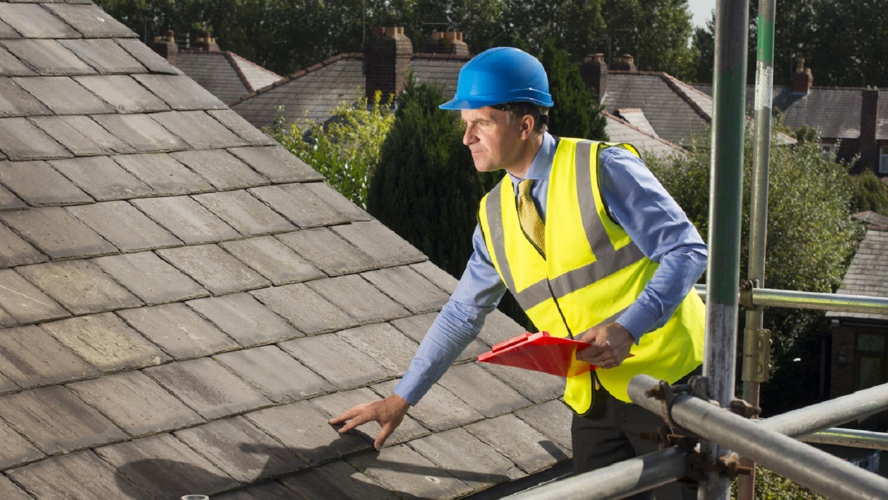 A builder on the roof