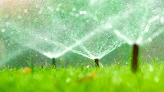 Close up of sprinklers on lawn