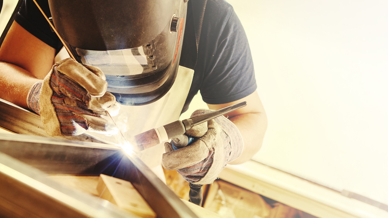 A welder working on a joint