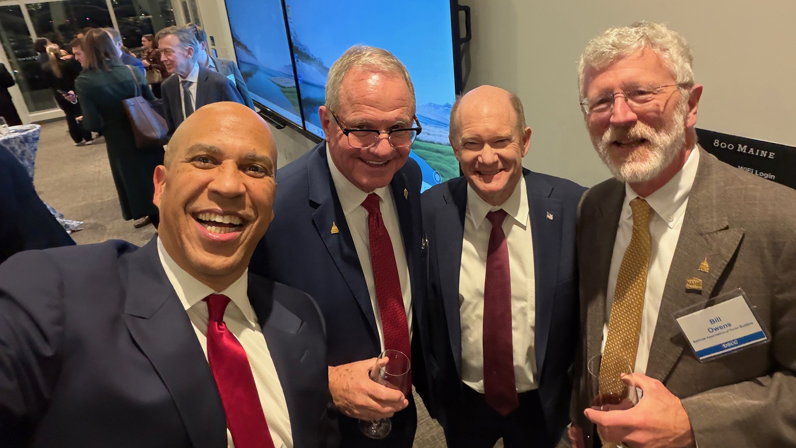 Sen. Cory Booker (D-N.J.), NAHB Second Vice Chairman Bob Peterson, Sen. Chris Coons (D-Del.), and NAHB First Vice Chairman Bill Owens