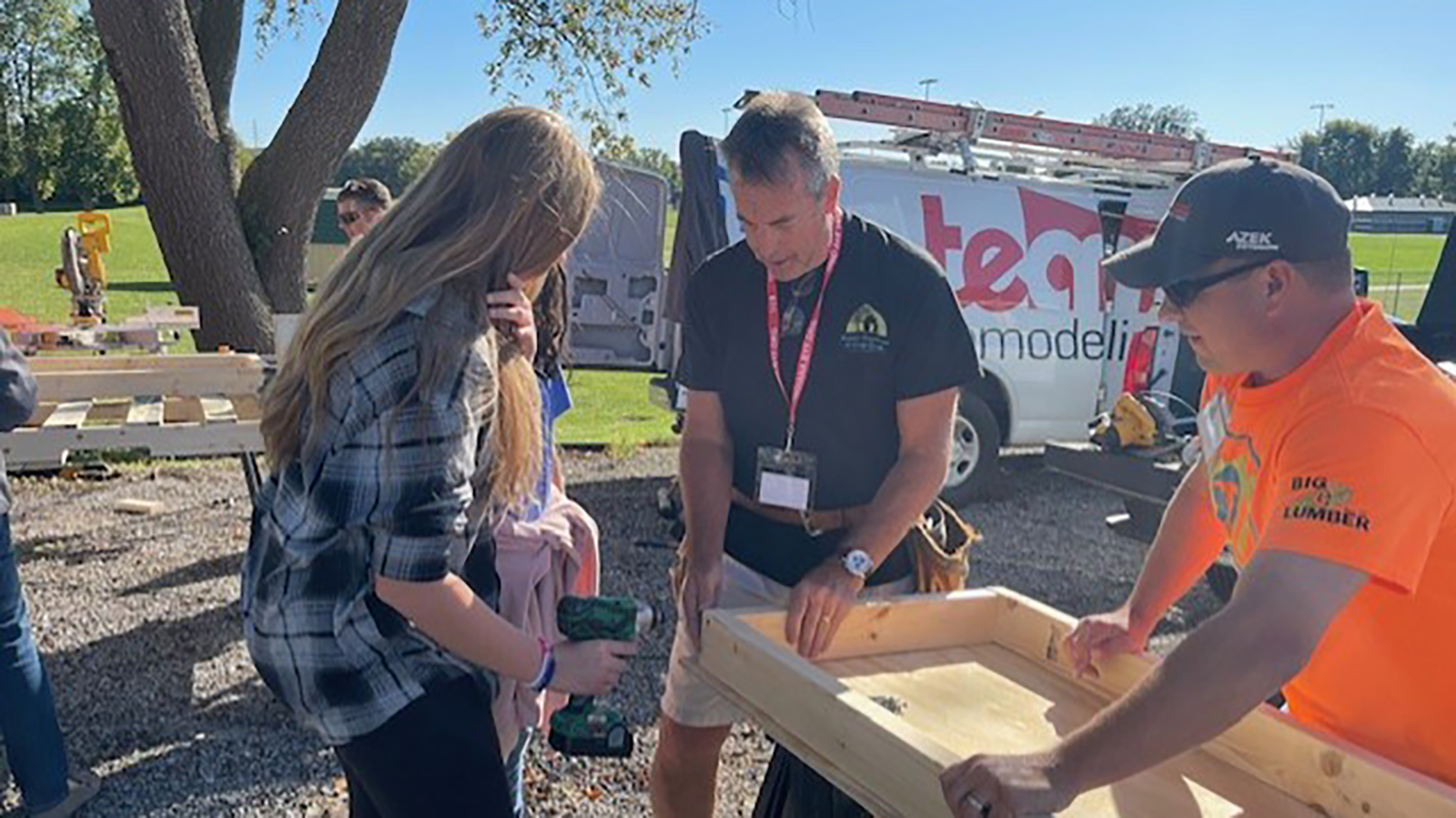 BAEC members guide students through a build activity.