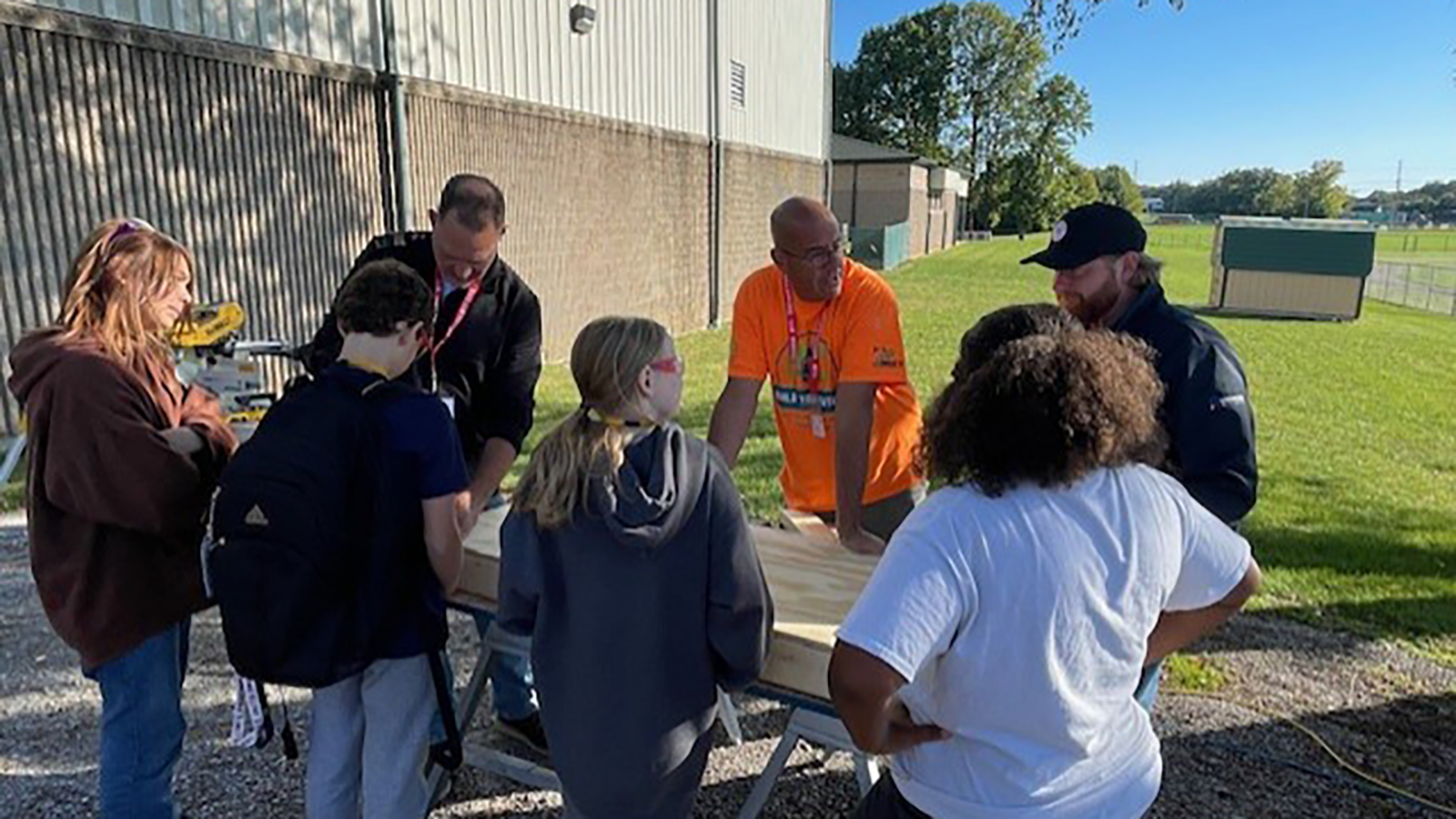 BAEC members guide students through a build activity.