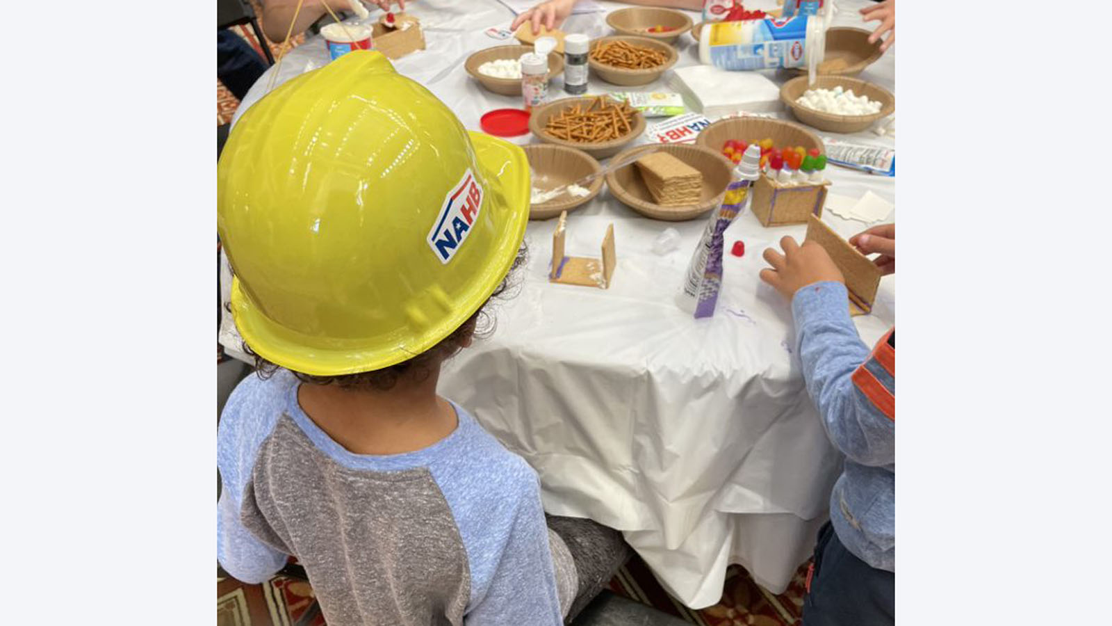 child with construction hat