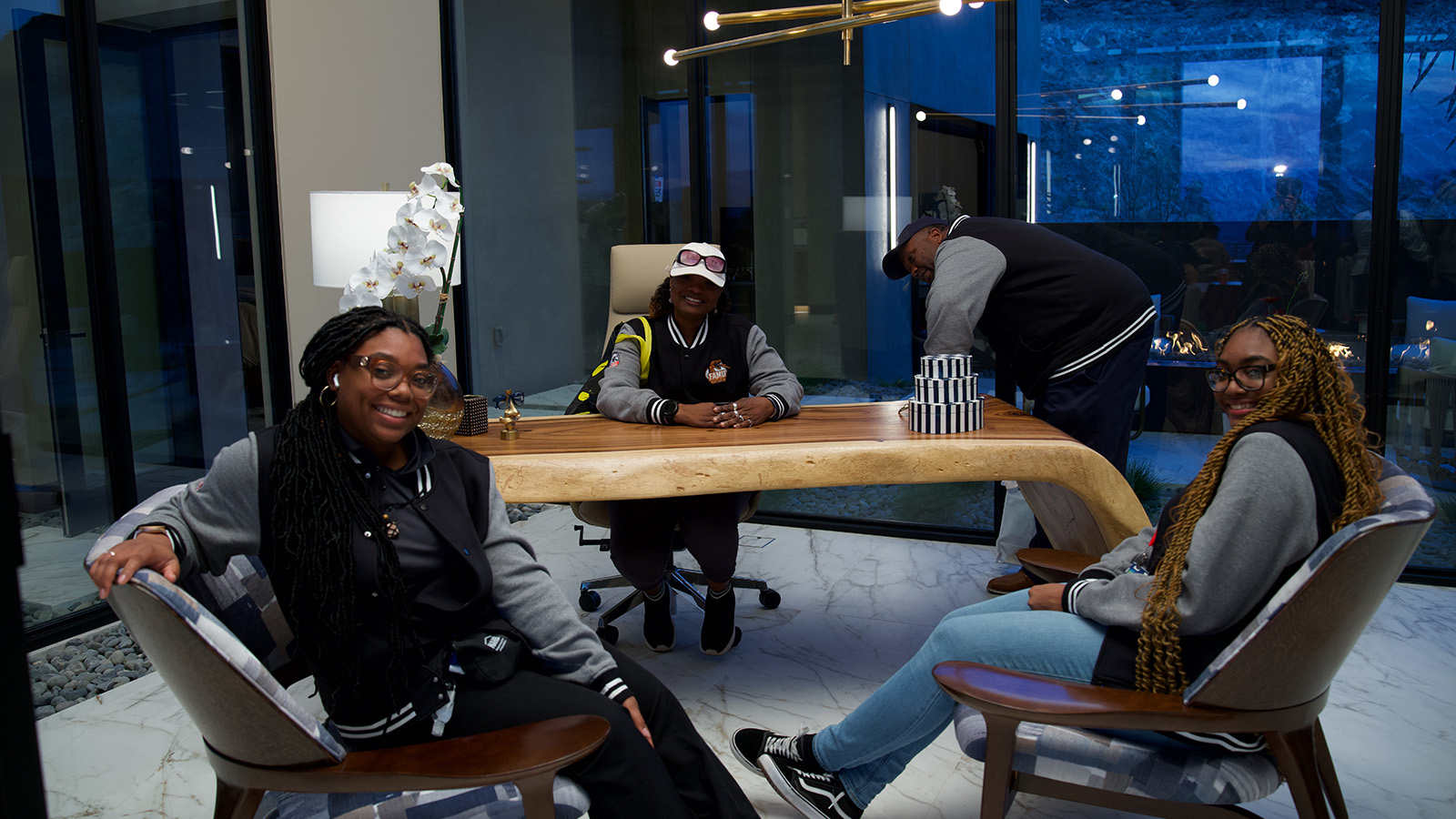 Students pose at the New American Home at IBS 2025