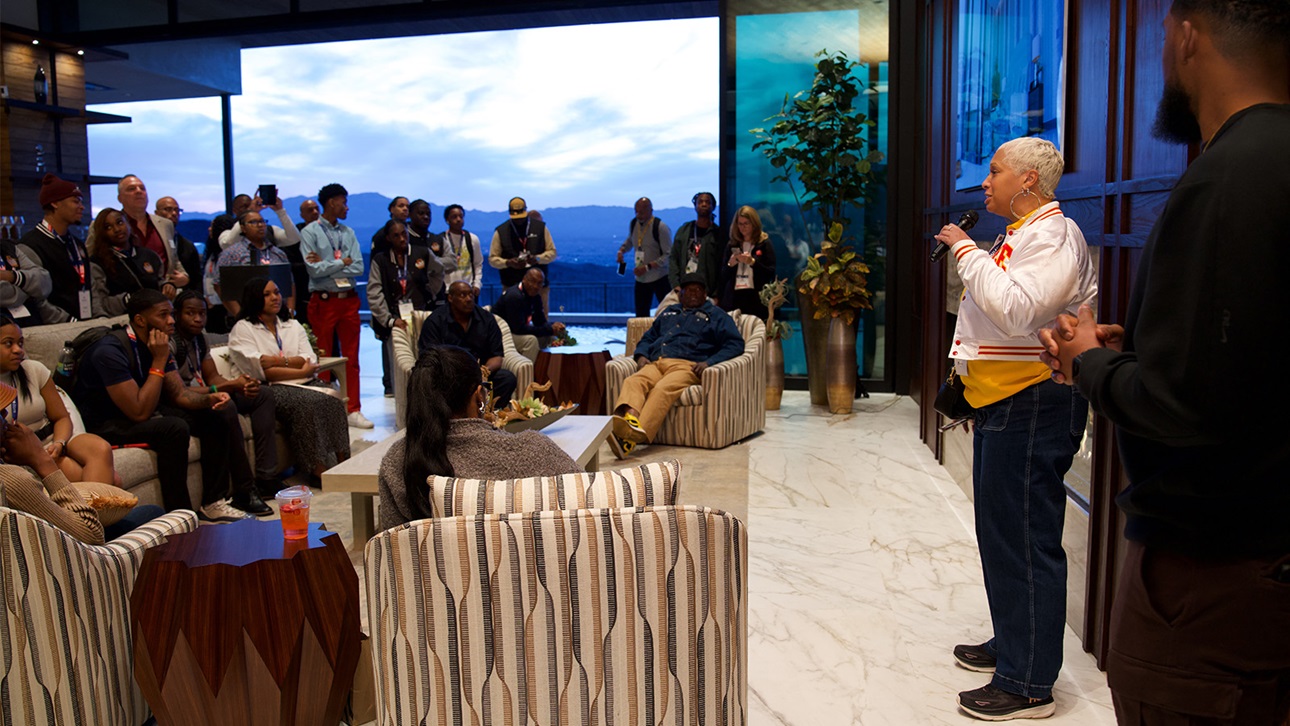 Dr. Charner Rodgers speaks with students at the 2025 Black Builder Mixer