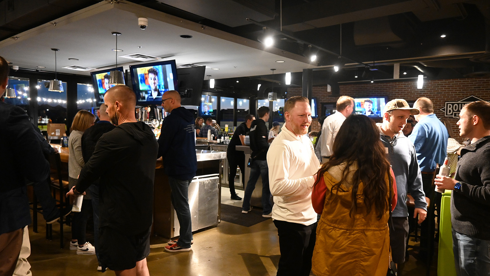 Members gathering at the Chicken N Pickle Missouri BUILD-PAC fundraiser 2024