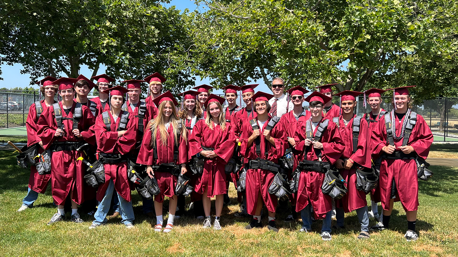 Students of the Donald Chaiken Building Industry Technology Academy pose on graduation day.