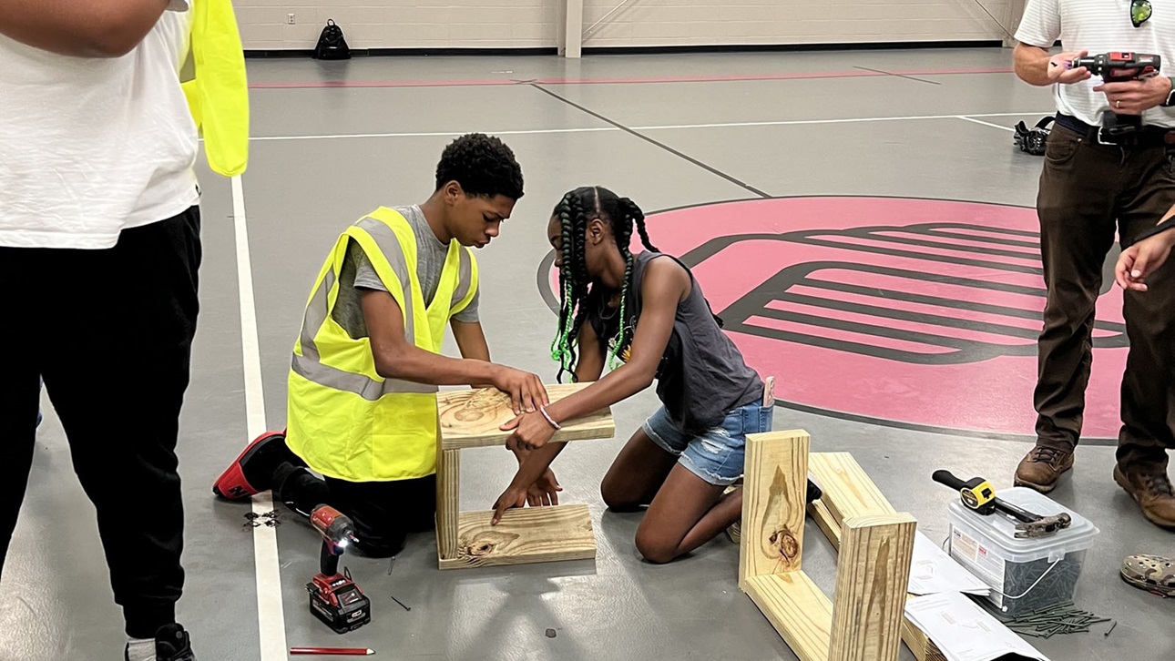 students working on construction project