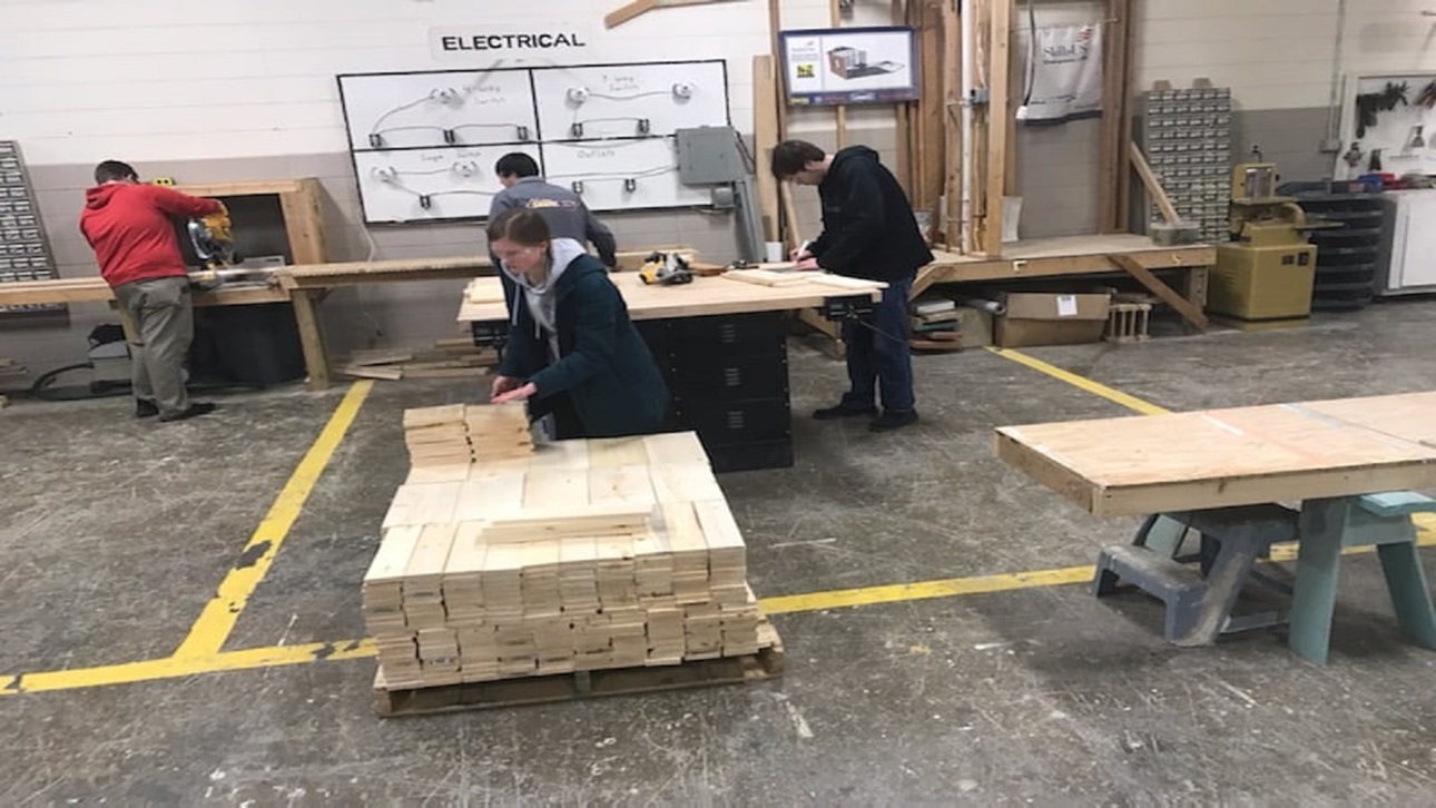 high school students prep toolboxes