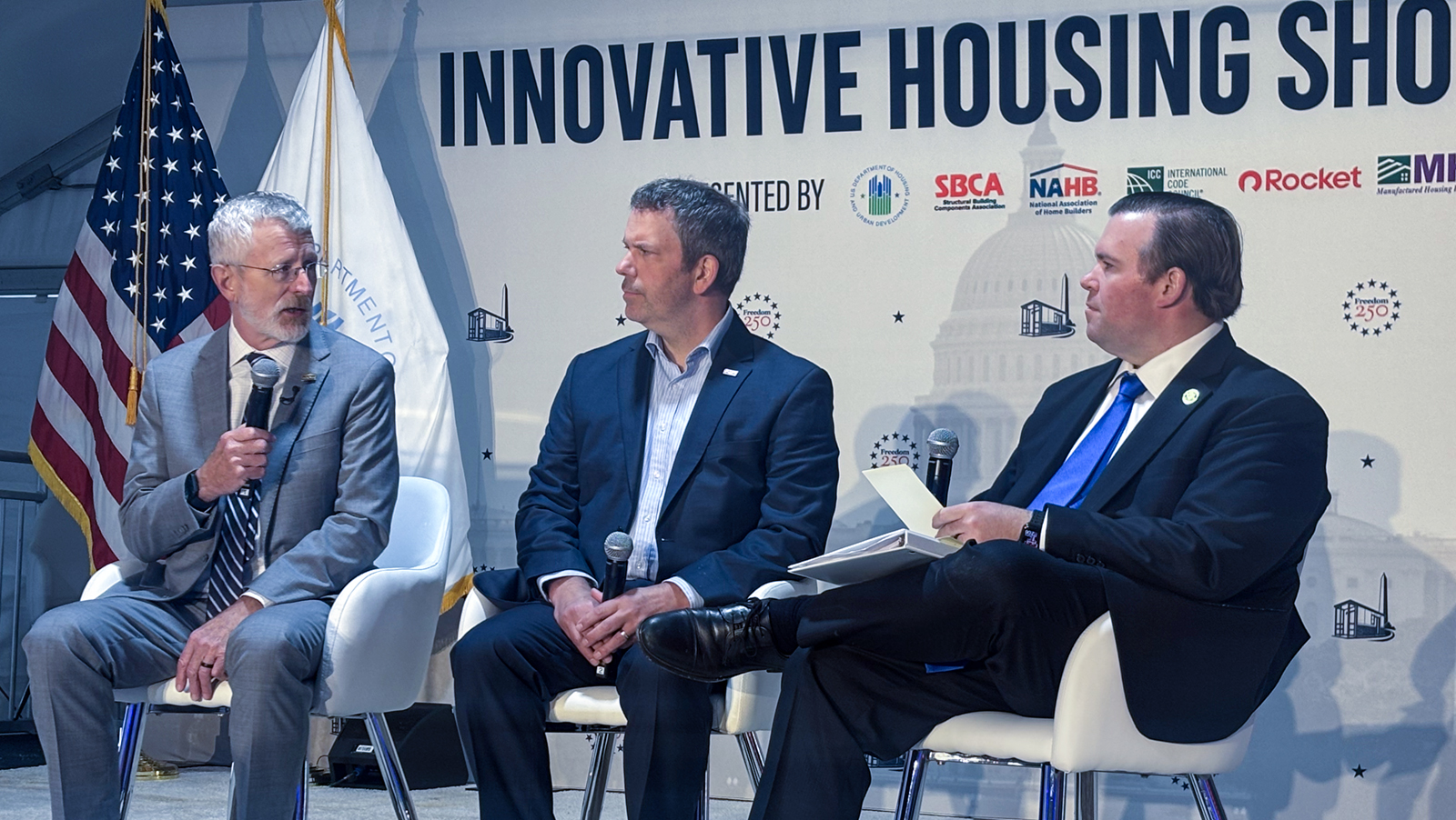 Bill Owens speaks during a panel discussion at the Innovative Housing Showcase