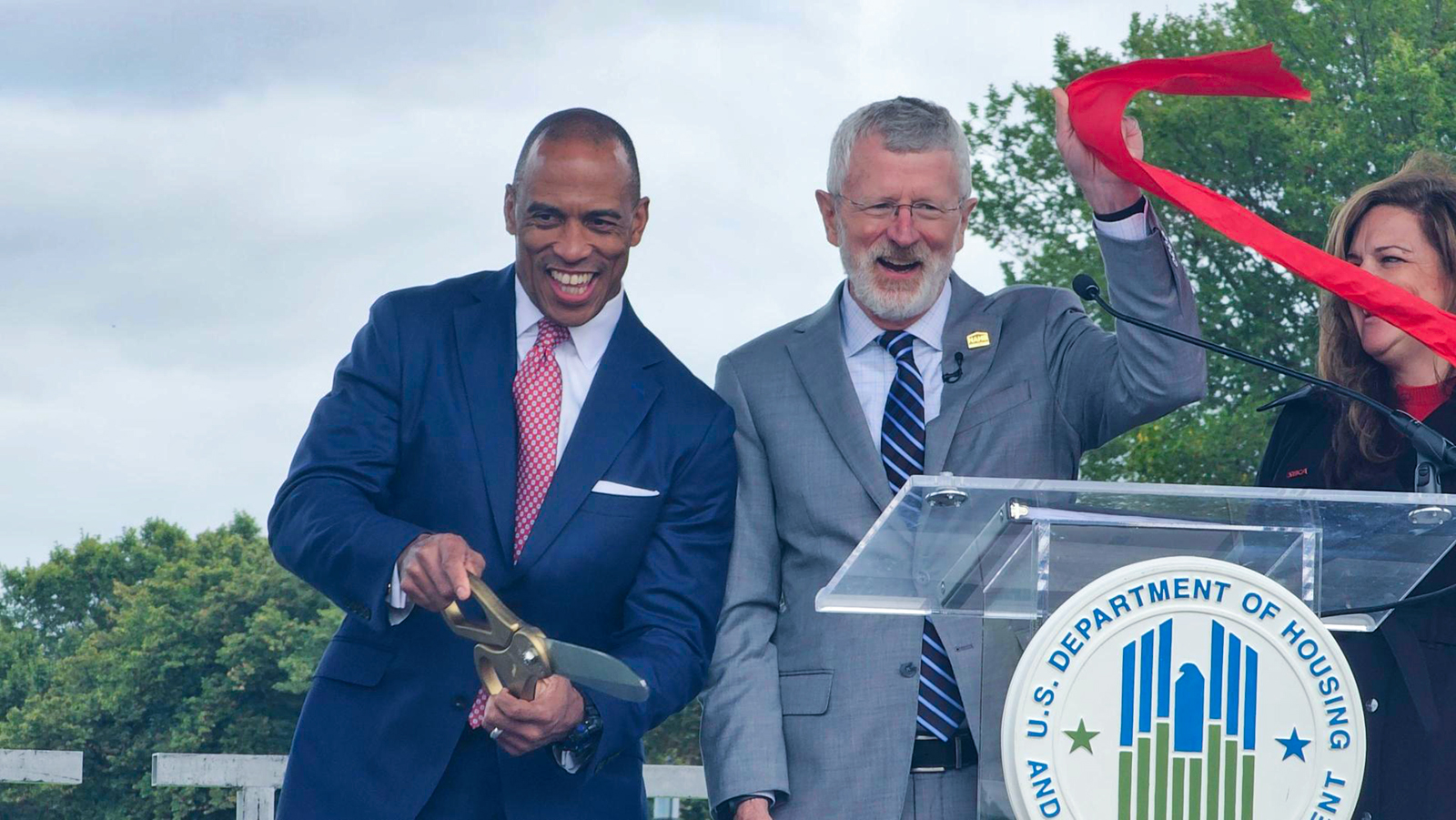 HUD Secretary Scott Turner and Bill Owens open the Innovative Housing Showcase with ribbon cutting