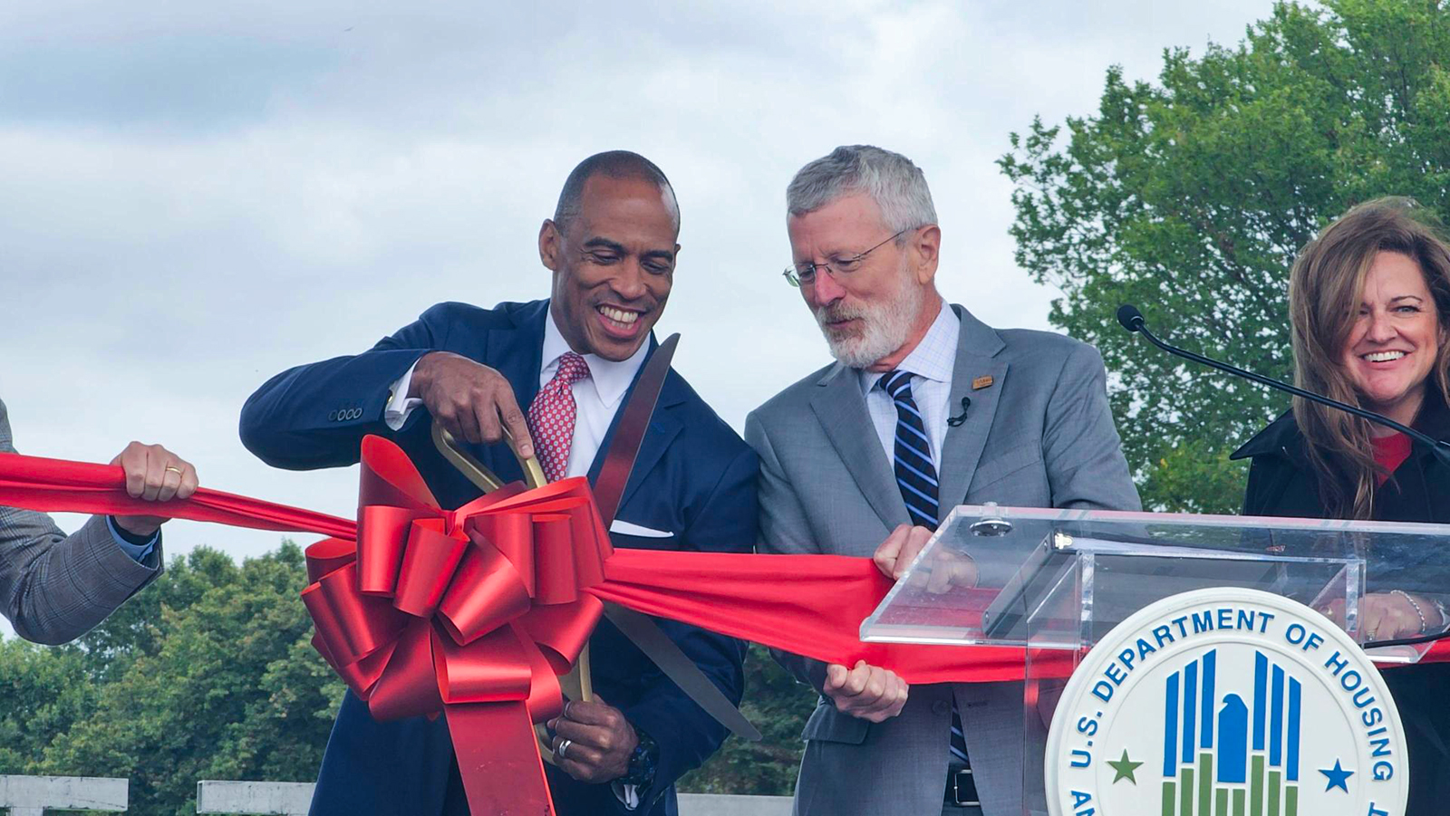 HUD Secretary Scott Turner and Bill Owens open the Innovative Housing Showcase with ribbon cutting