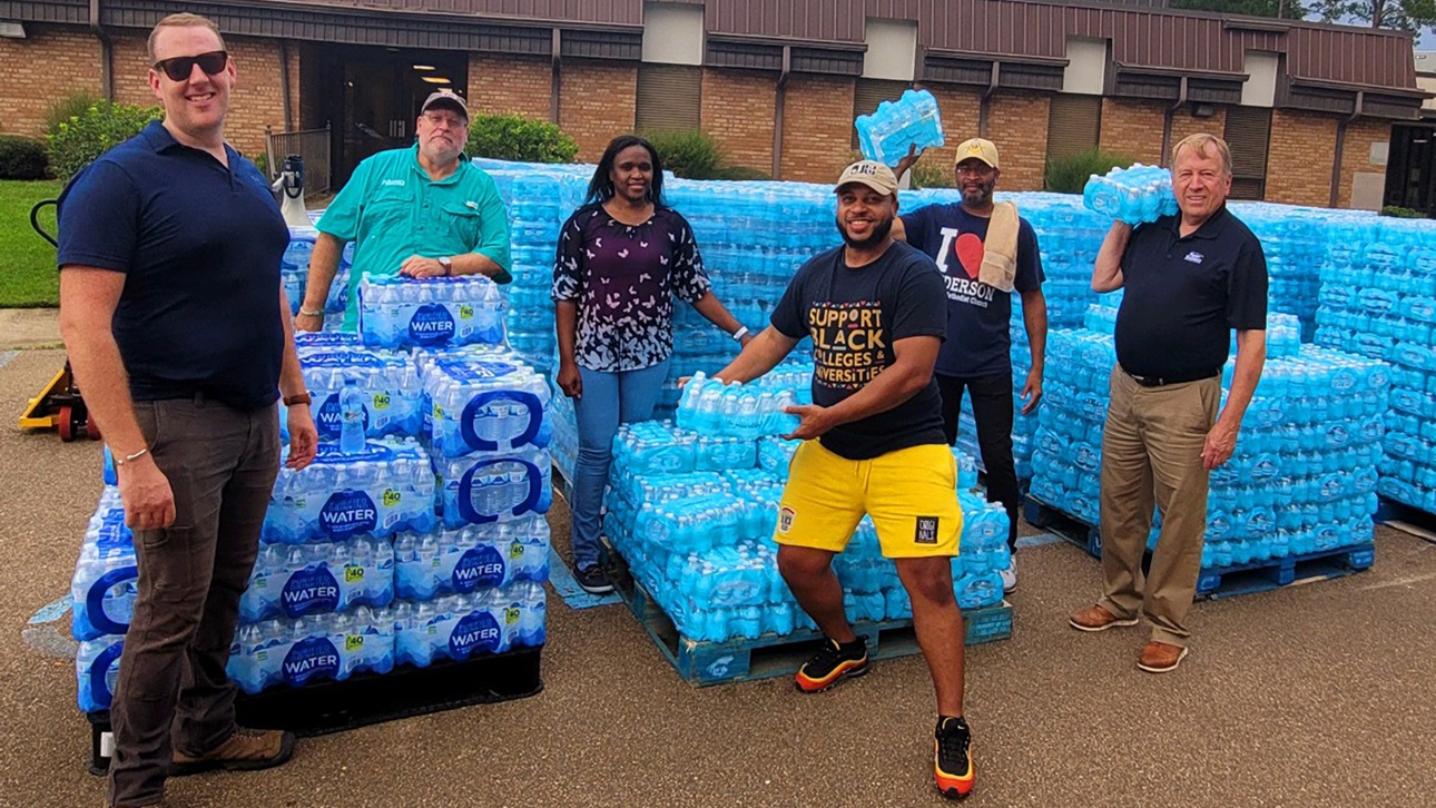 NAHB members with pallets of bottle water