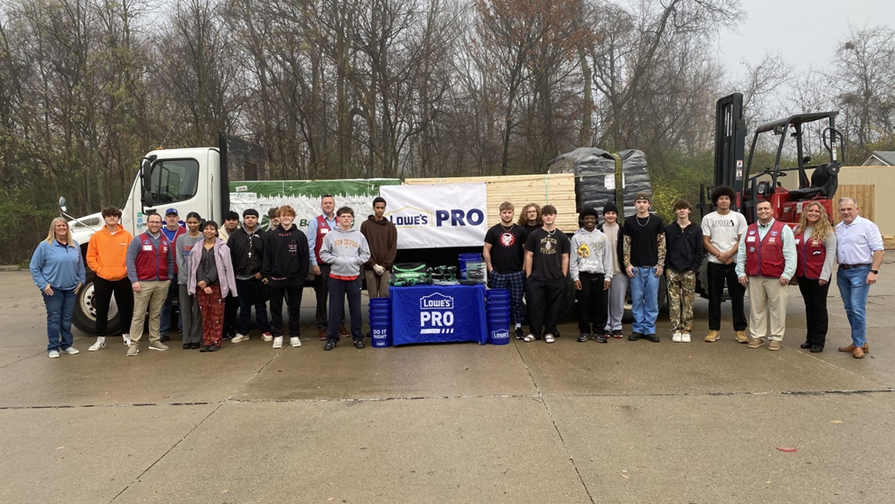 group of students with new donated tools