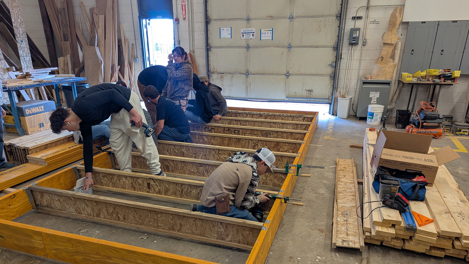 Students build a "tiny" home with the Santa Fe Area Home Builders Association.