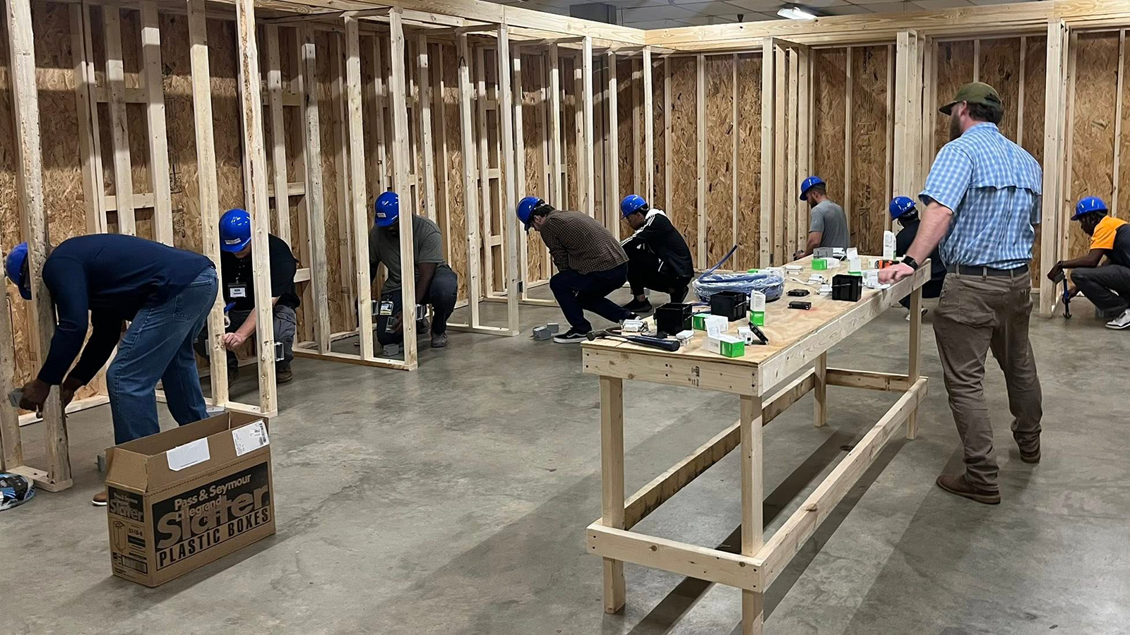 SAHA students learn the electrical trade during class.