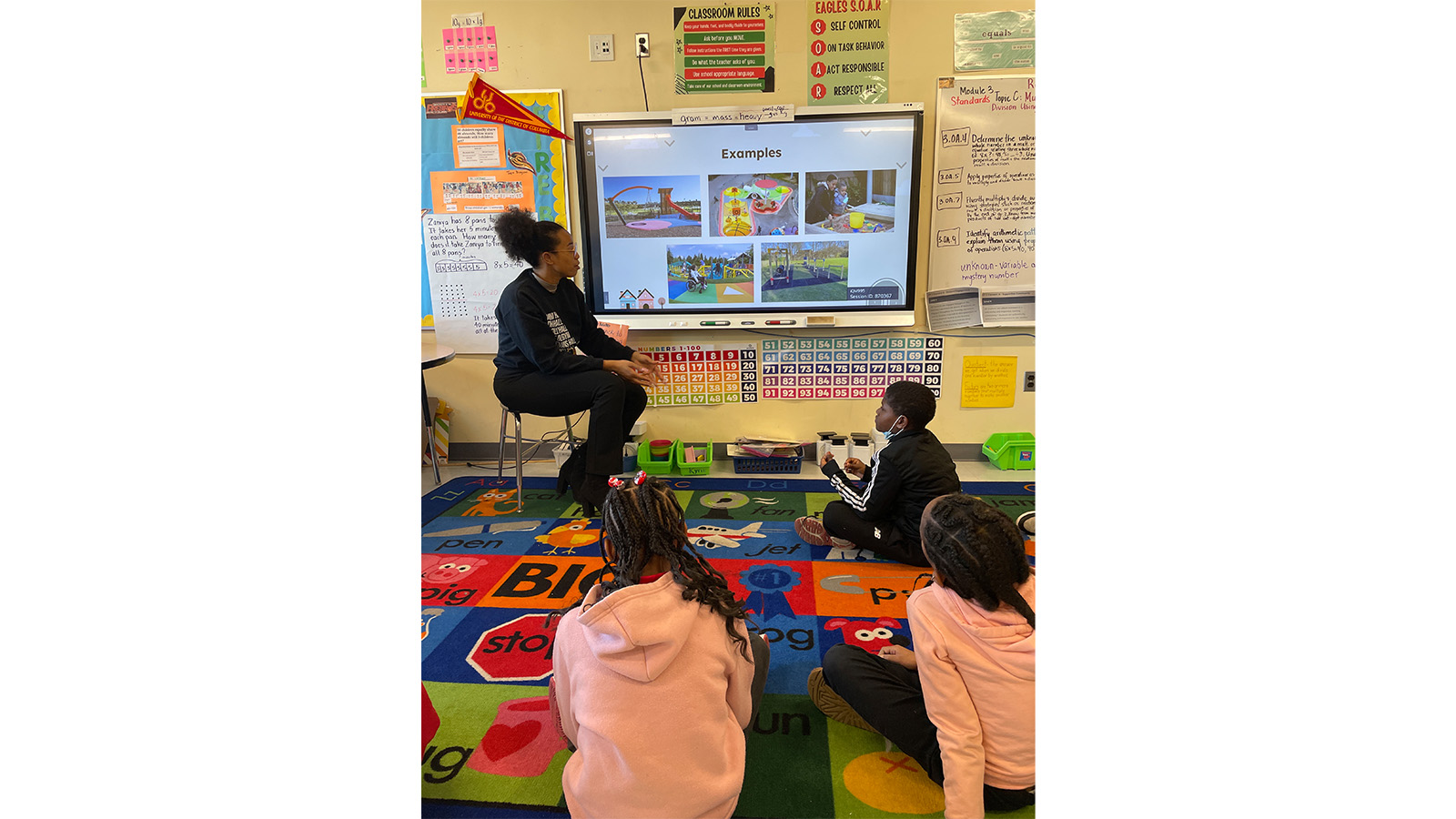 Zhetique Gunn reading to students