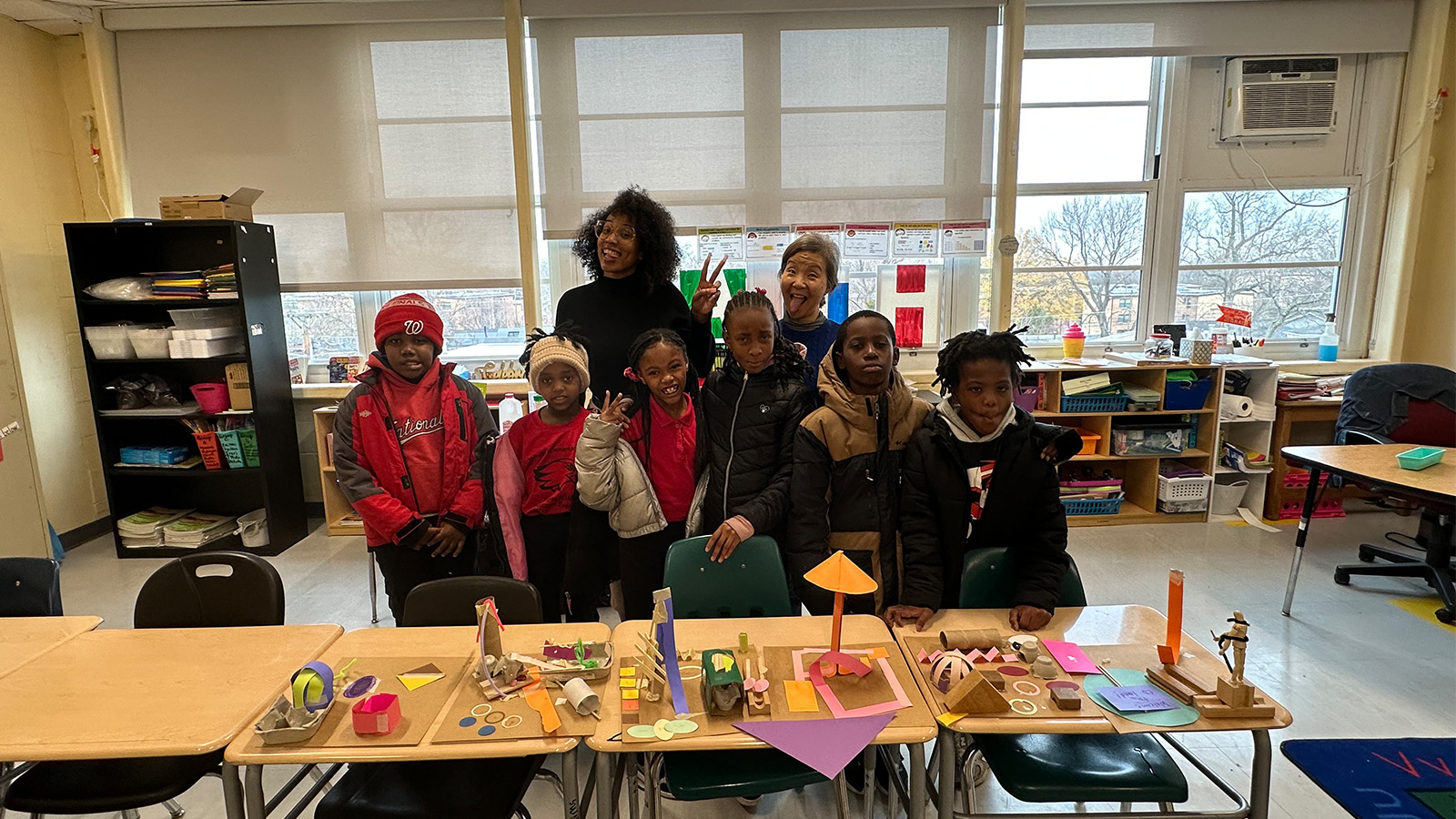 Zhetique Gunn posing with students