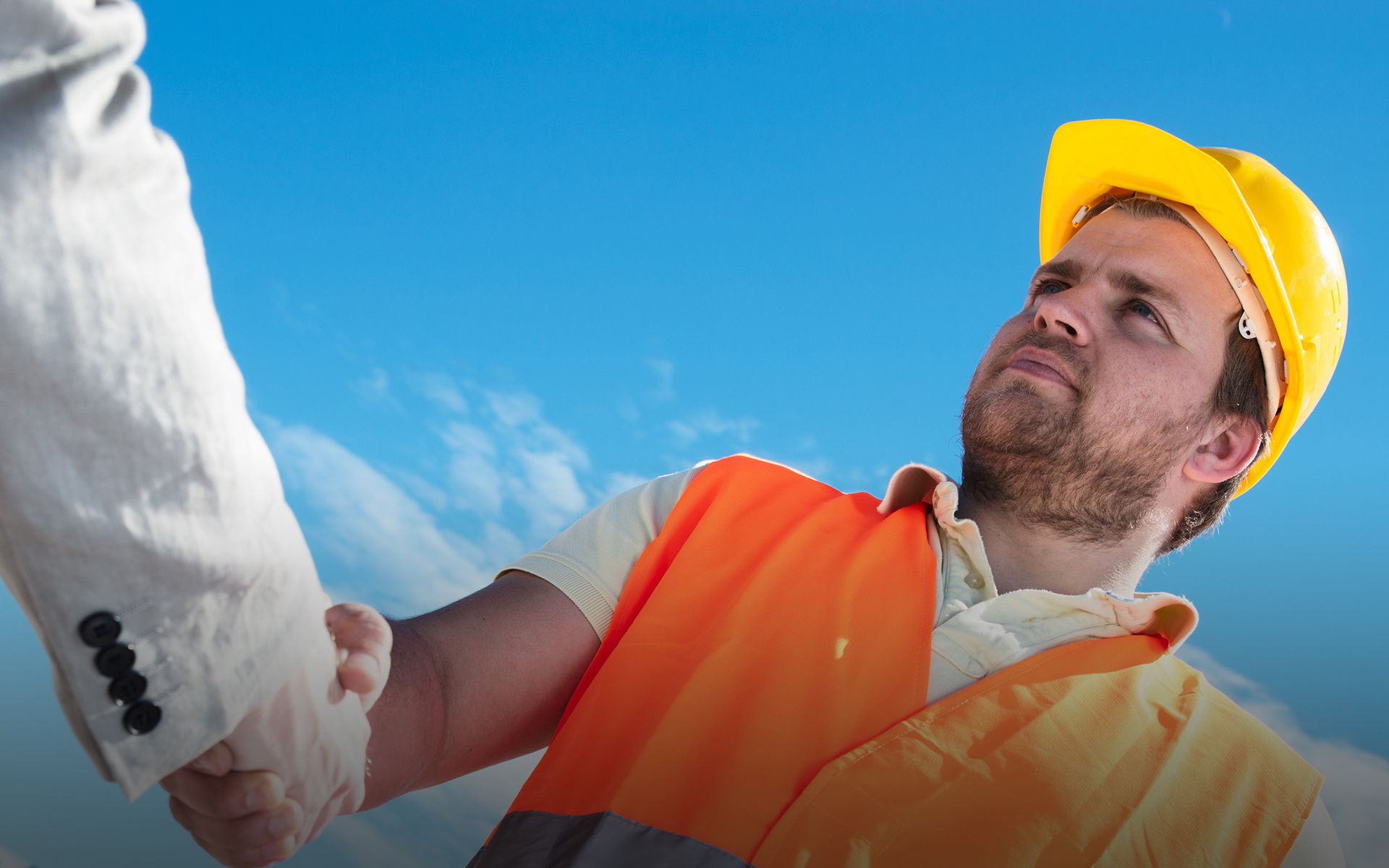 Builders shaking hands