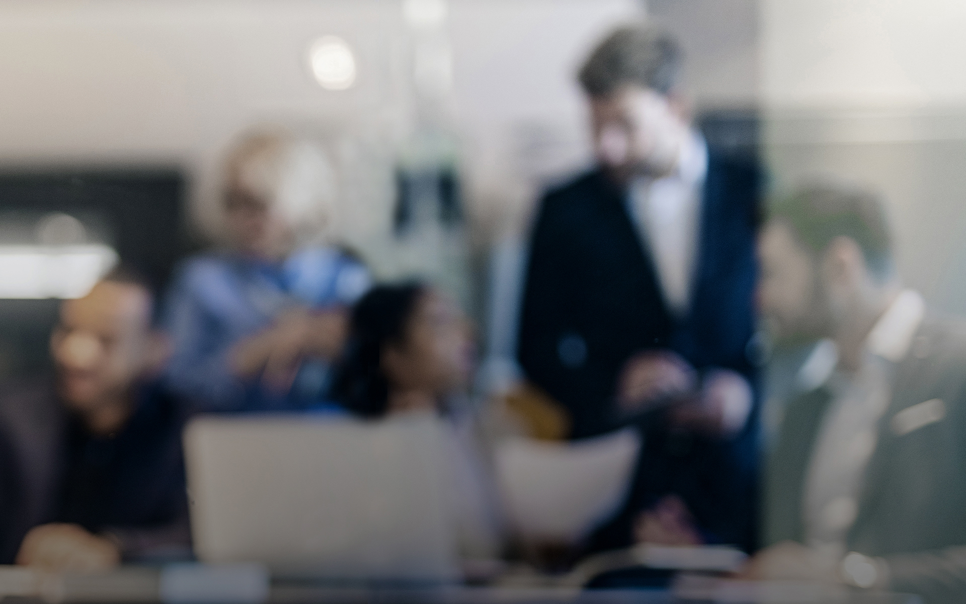 A group of council members engaged in a discussion
