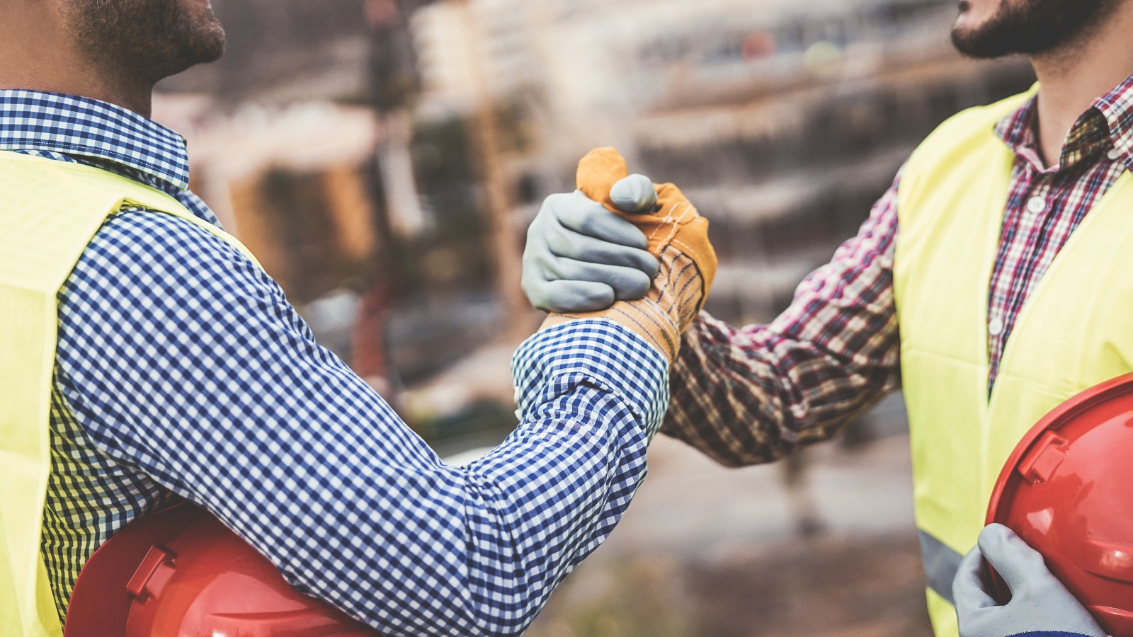 Construction Workers Shaking Hands