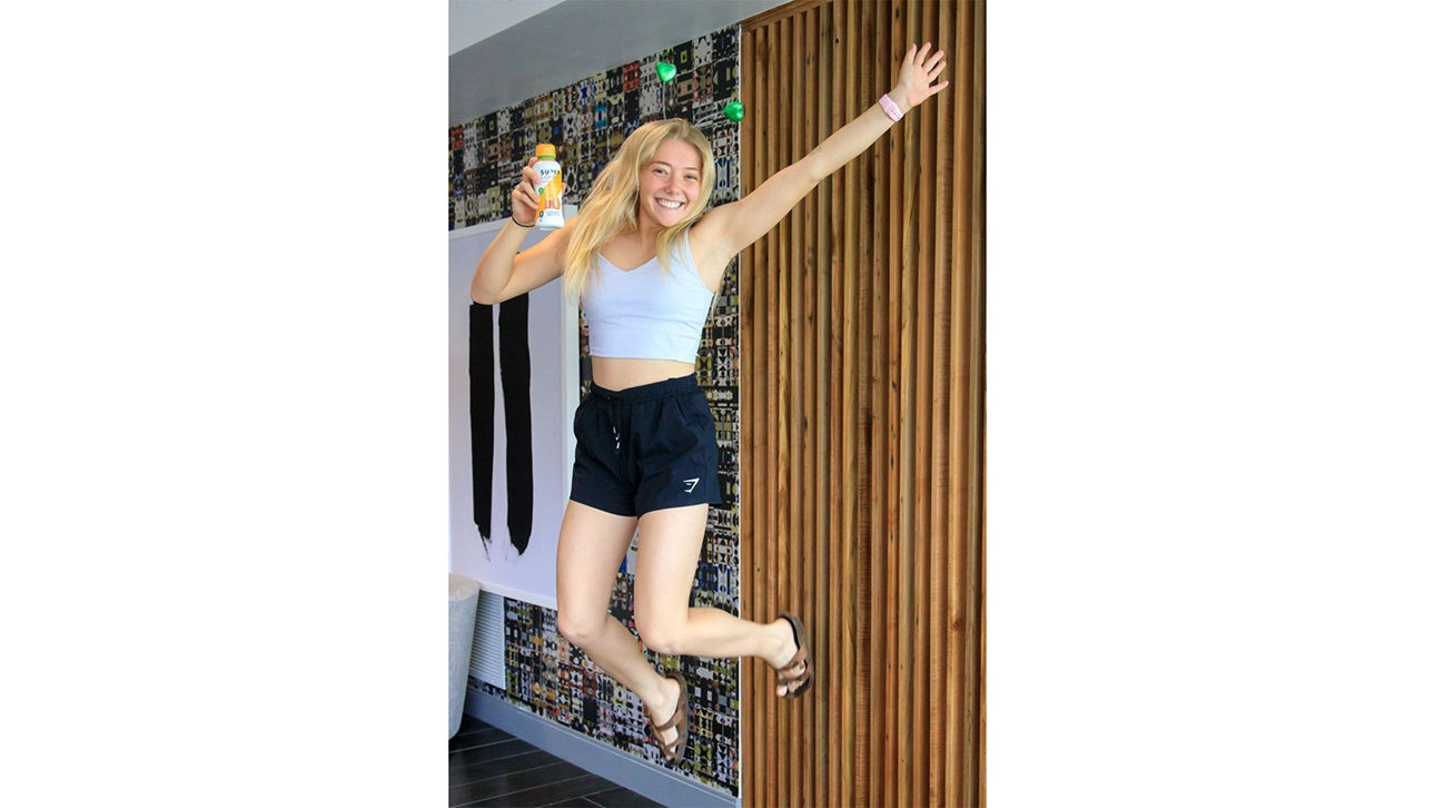 RWK Residential woman jumping celebrating