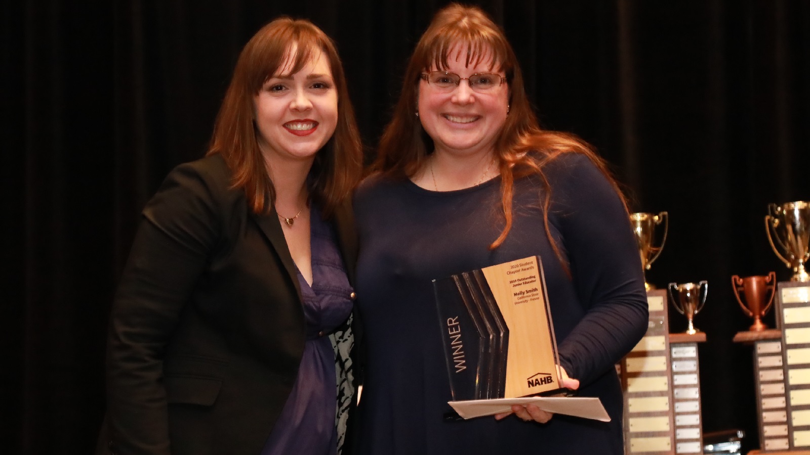 Molly Smith accepts the award at IBS 2020.