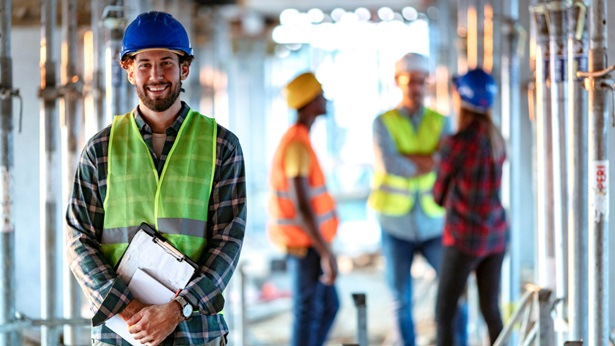 Construction workers talking to each on on the job site