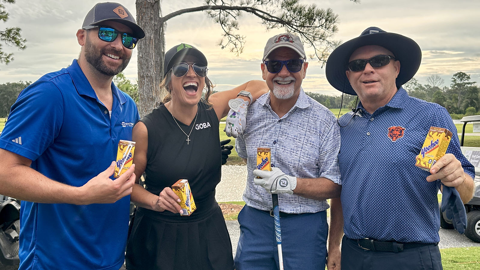 group of staff at golf course
