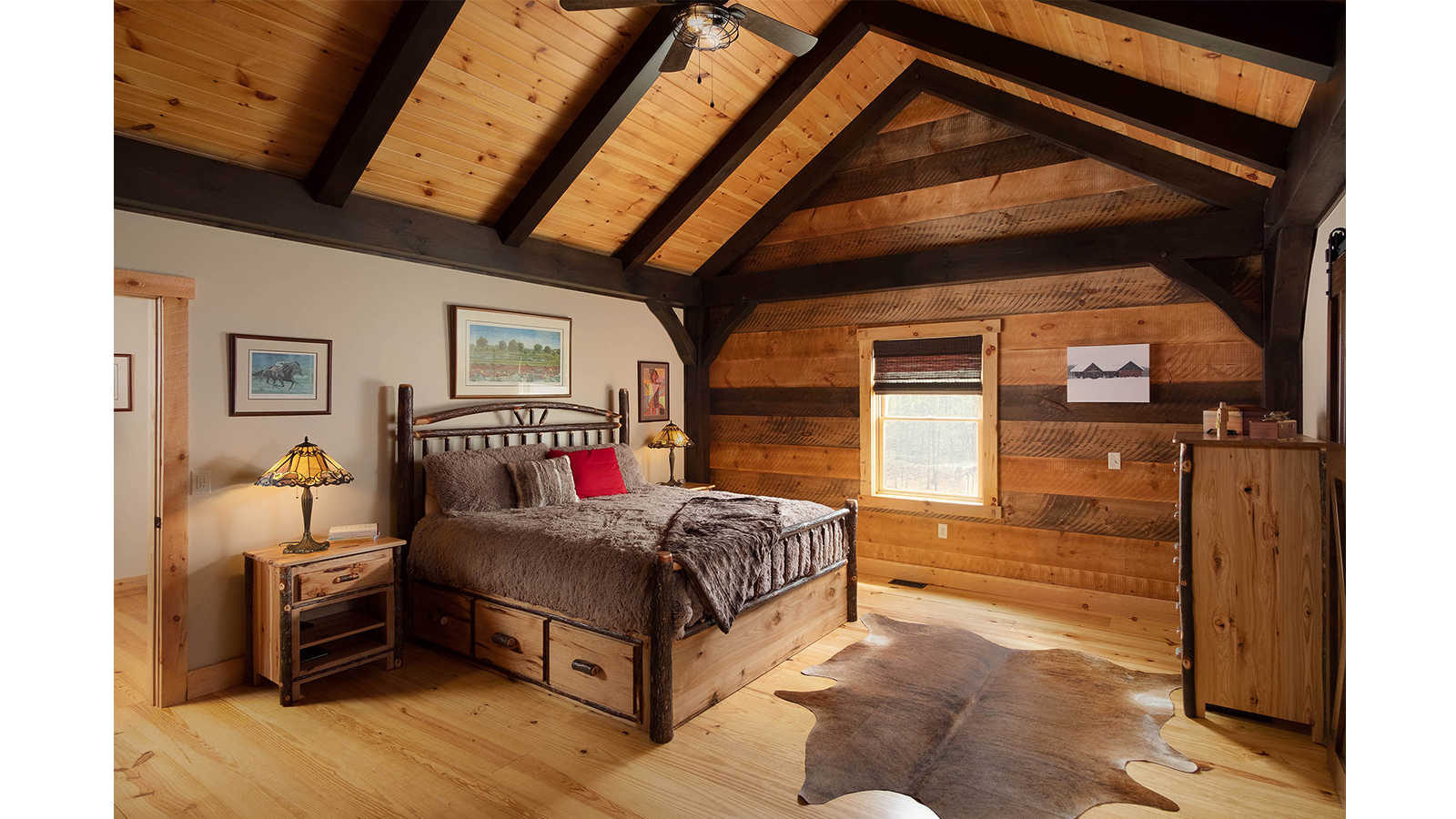 The bedroom of Timberhaven's Saratoga timber home