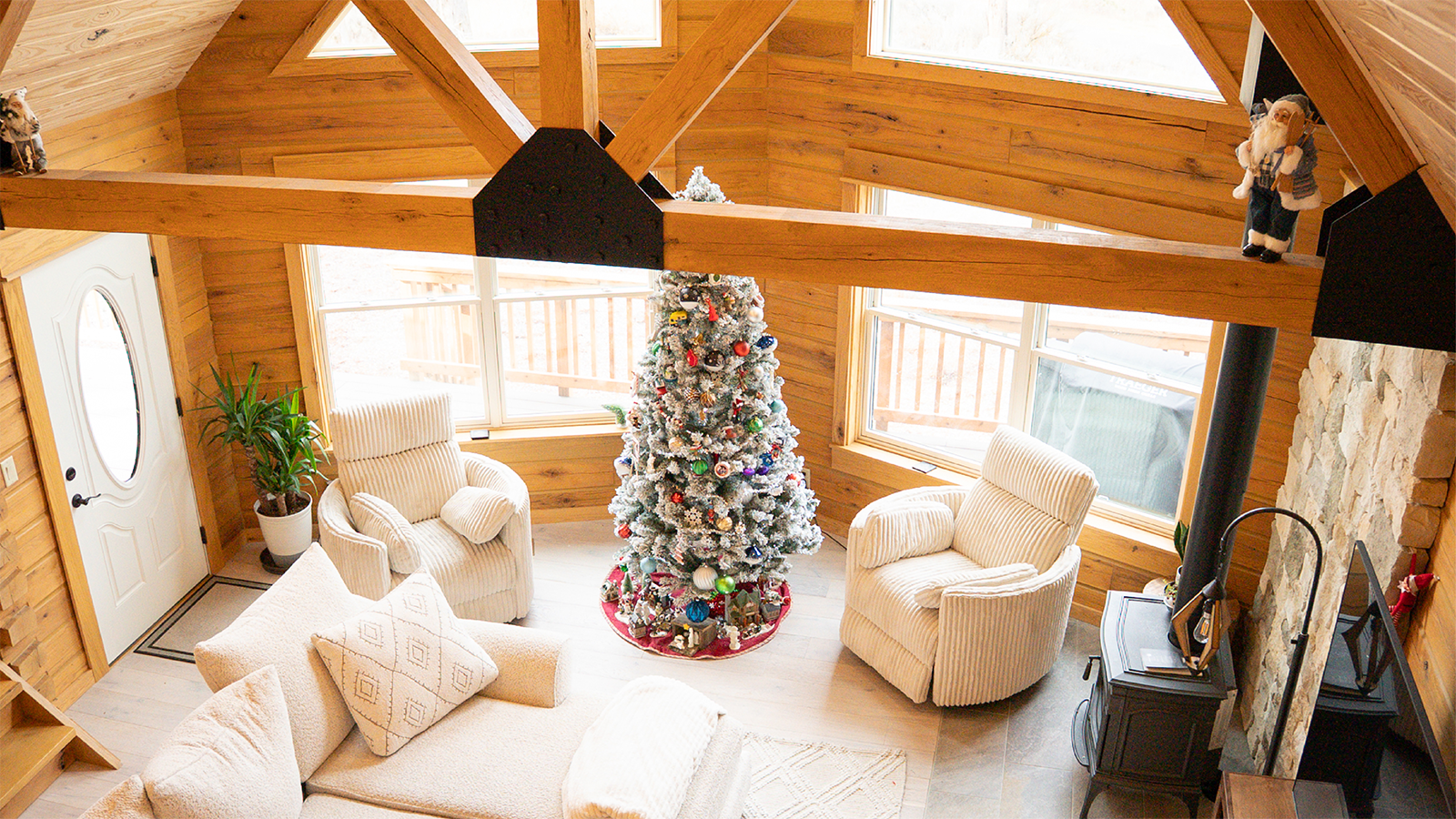 Aerial view of Christmas tree in living room of Gastineau home
