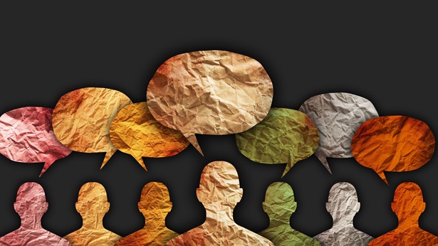 A group of people asking questions