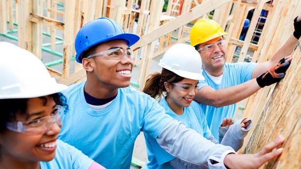 Students working at a construction site
