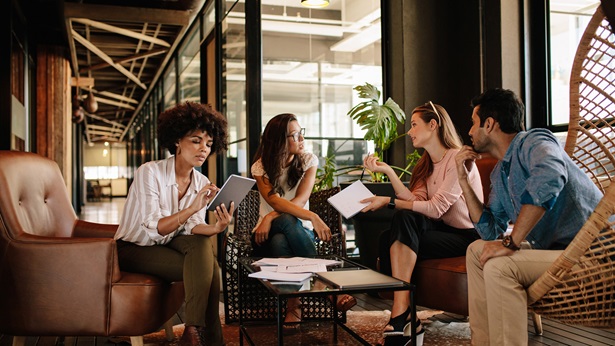 A picture of young professionals having a conversation